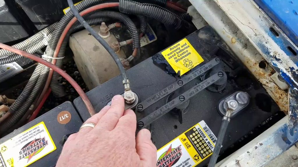 A Club Car battery being checked