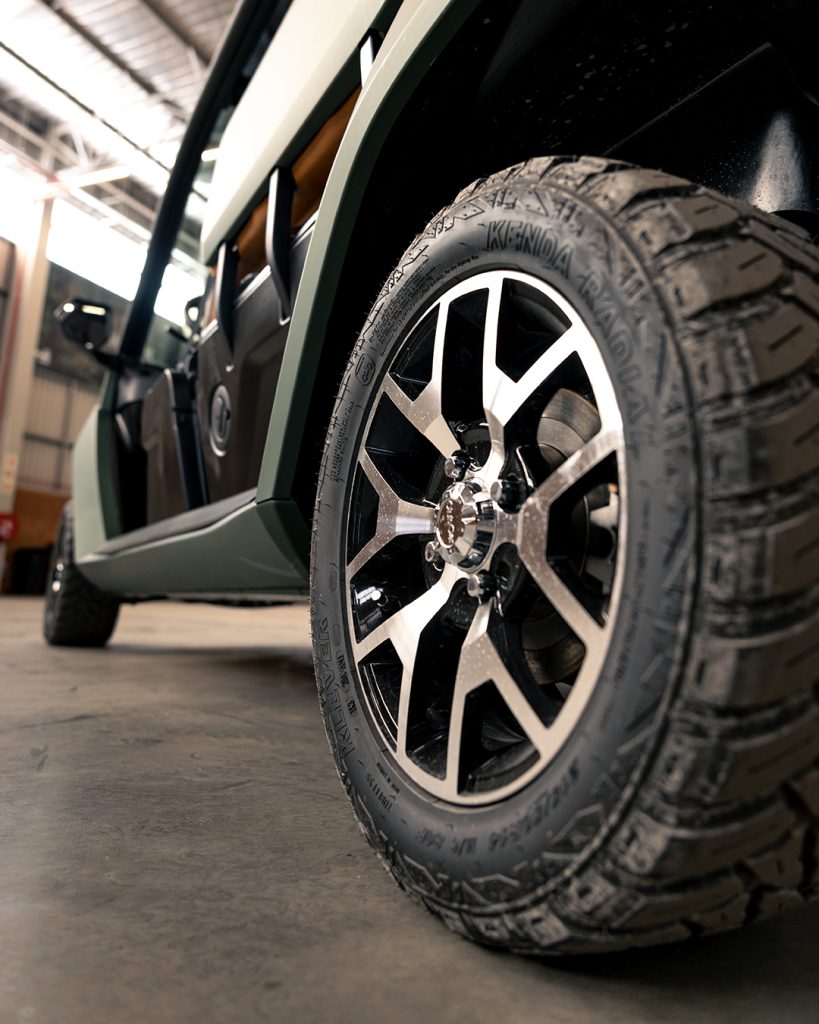 A photo of the back wheel of a Club Car CRU