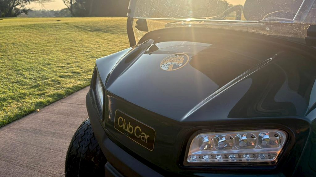 A photo of a nose of a Club Car Tempo showing Leopard Creek logo on the hood.