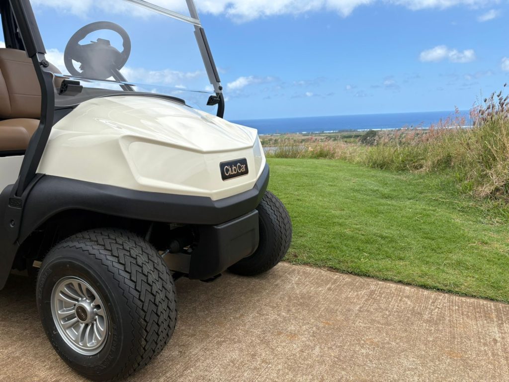 Close-up view of Club Car Tempo 2 Lithium from the front on course at La Réserve, Mauritius