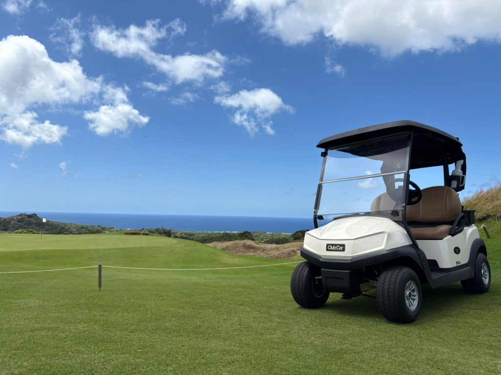 Club Car Tempo 2 Lithium cart positioned near a tee box at La Réserve, Mauritius