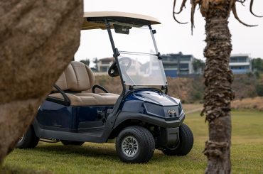 Club Car golf cart parked on the fairway during routine service visit